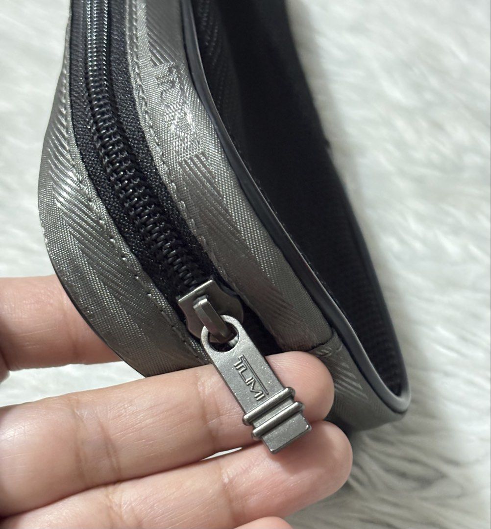 Tumi Mesh Travel Pouch (Category: Purses & Pouches) located in Paranaque City. Submitted by dalle_closet (Listing ID 1468355826, Image 2). Description: size: 9.5 x 3.3 inches slightly used pa.