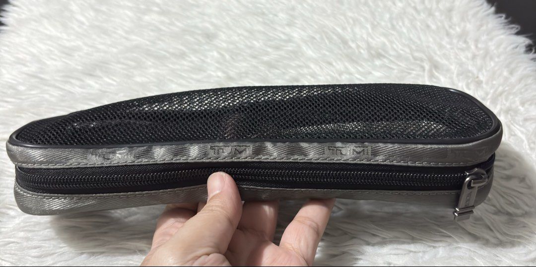 Tumi Mesh Travel Pouch (Category: Purses & Pouches) located in Paranaque City. Submitted by dalle_closet (Listing ID 1468355826, Image 3). Description: size: 9.5 x 3.3 inches slightly used pa.