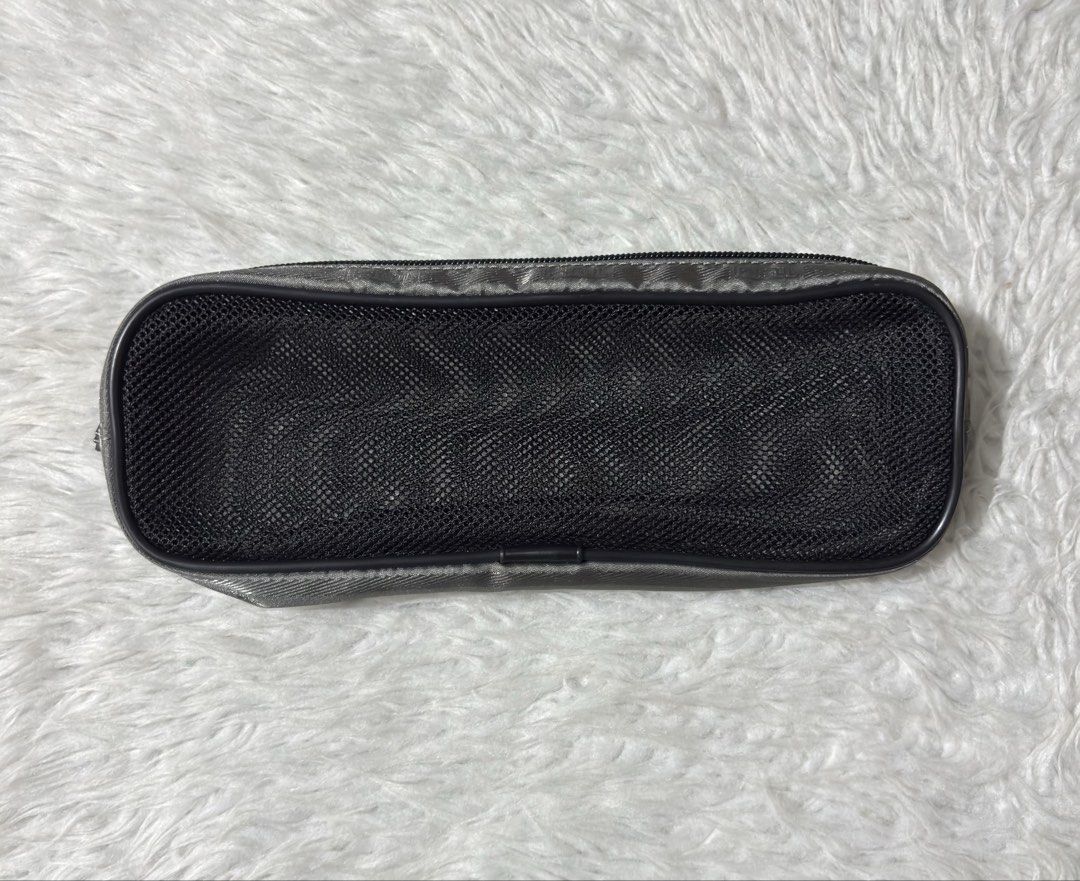 Tumi Mesh Travel Pouch (Category: Purses & Pouches) located in Paranaque City. Submitted by dalle_closet (Listing ID 1468355826, Image 1). Description: size: 9.5 x 3.3 inches slightly used pa.