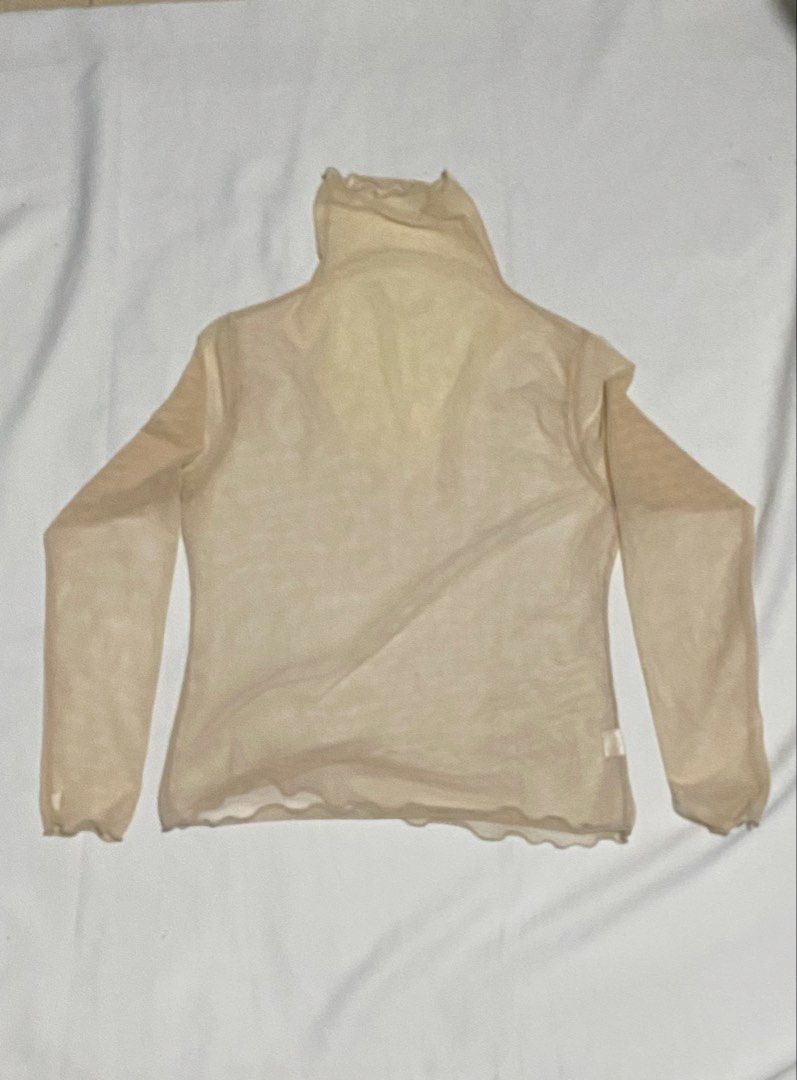Turtleneck Mesh Top in Beige (Category: Others Tops) located in Makati City. Submitted by weirdshopping (Listing ID 1468294756, Image 1). Description: Selling pre-loved clothes! DETAILS: ~ All items are in good condition. - BRANDED - All clothes are sanitized before delivery. ~ Mode of Payment: Cash & Gcash - Available for delivery c/o by costumer: Lalamove, Grab, Angkas ~ Location: Guadalupe Viejo, Makati ~ FOR meet up, pick up, & delivery! (Del