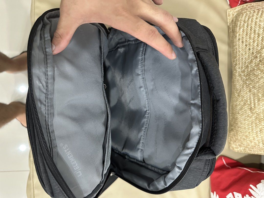 U Elements Backpack (Category: Backpacks) located in Mandaluyong City. Submitted by jokrm (Listing ID 1468313797, Image 2). Description: Color: Dark grey Material: Durable fabric suitable for daily use Compartments: Multiple zipped pockets on the front Perfect for office bag as this bag has a built-in lock No issues .