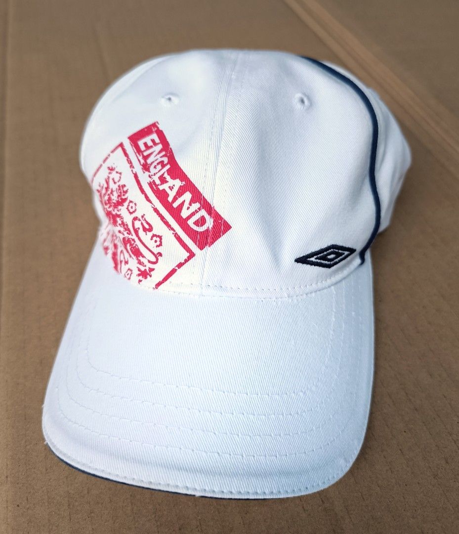 UMBRO Team England White Graphic Design Cap (Category: Caps & Hats) located in Bacoor. Submitted by nineties_kid (Listing ID 1468378796, Image 2). Description: <==• UMBRO Team England White Graphic Design Cap *Size: XL- 7 ⅝ *24 Inches diameter ___________ ▶LBC Cash on Pick-up (C.O.P) Offer nation-wide delivery, as long as there is an LBC branch near your area. ▶LBC C.O.D ▶Lalamove. ▶J&T Regular Delivery only. ▶Meet-up: Bacoor Area or Mandaluyong/
