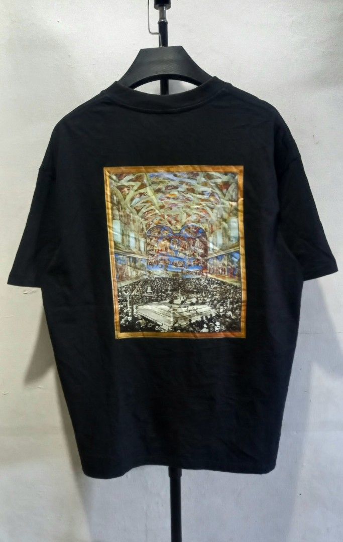 Undefeated Black Graphic Tee Large (Category: Tshirts & Polo Shirts ) located in Tarlac. Submitted by den420 (Listing ID 1468284089, Image 2). Description: - Brand: Undefeated - Color: Black - Size: Large (tag attached) - Material: 100% Cotton, Made in USA - Design: Small chest logo on front, large framed artwork print on back - Condition: Brand new with tags.