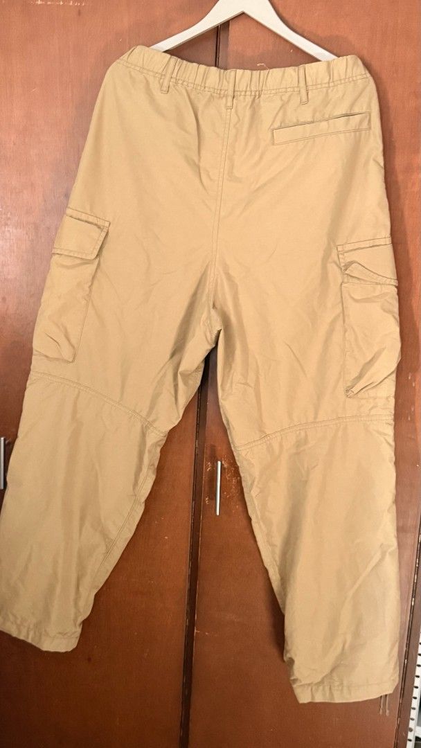 Uniqlo Cargo Pants Beige Size L (Category: Trousers) located in Pasig City. Submitted by 35th.store (Listing ID 1468491151, Image 3). Description: - Brand: Uniqlo - Item: Cargo Pants - Color: Beige - Size: L (Waist 84-92cm) - Material: 66% Cotton, 34% Nylon - Fit: Relaxed - Features: Handy side cargo pockets and adjustable cuffs - Condition: Great for everyday casual rotation no issues.