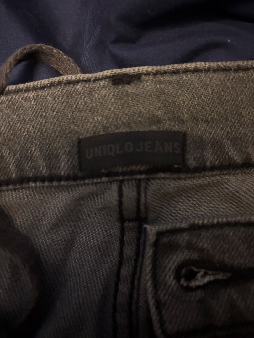 Uniqlo Jeans Dark Grey Wash (Category: Jeans) located in Manila. Submitted by ahiadg_ (Listing ID 1468342680, Image 2). Description: - Brand: Uniqlo - Color: Dark grey washed - XL - Fit: Mid-rise - Closure: Front button and zipper - Details: Classic denim texture with stylish fading throughout - Style: Comfortable everyday pair, easy to match with tees and hoodies.