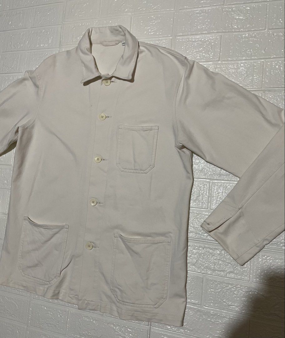 Uniqlo Washed Jersey Work Jacket Off White (Men's Large) (Category: Coats, Jackets and Outerwear) located in Marilao. Submitted by clear_out_closet (Listing ID 1468352322, Image 3). Description: Item Details: 👇 • Brand: Uniqlo • Style: Washed Jersey Work Jacket (Style Code: 425079 / Spring 2020 Collection) • Color: Off-White / Natural Cream • Official SRP: ~₱1,990 – ₱2,490 • Material: 96% Cotton, 4% Spandex (heavyweight stretch jersey/twill knit
