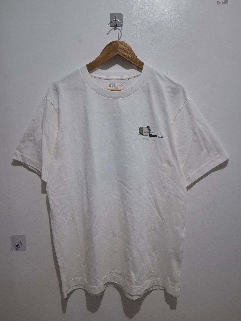 Uniqlo x kaws XL (Category: Tshirts & Polo Shirts ) located in Tarlac. Submitted by christopher.24 (Listing ID 1468315349, Image 1). Description: excellent condition legit.