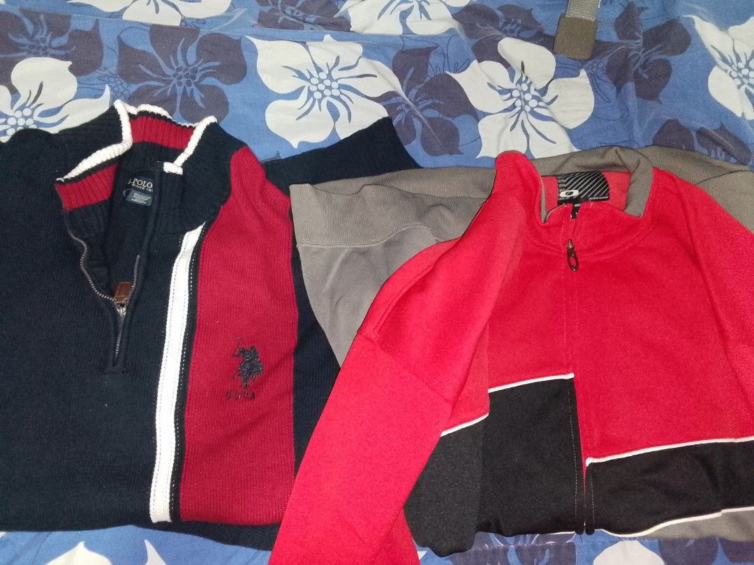US Polo Assn sweater and Oakley zip jacket bundle (Category: Coats, Jackets and Outerwear) located in Antipolo. Submitted by b1gmacc (Listing ID 1468461257, Image 1). Description: - 2-piece bundle: US Polo Assn quarter-zip sweater and Oakley full-zip jacket - US Polo Assn sweater: Dark navy blue with red and white stripe details and embroidered horse logo - Oakley jacket: Red, black, and grey colorblock pattern - Warm fabrics, perfect for casual 