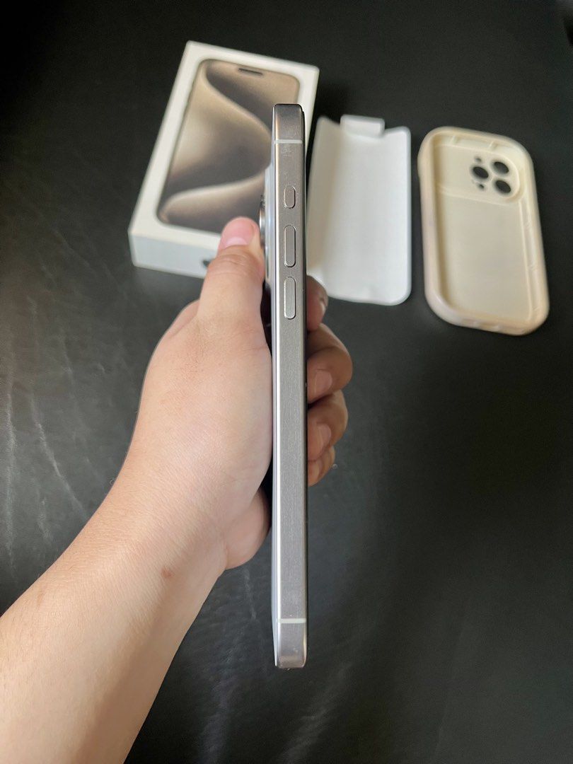 US variant iPhone 15 Pro Max 256 gb - Natural Titanium (Category: iPhone 15 Series) located in Angeles City. Submitted by ivylivin (Listing ID 1468296042, Image 3). Description: iPhone 15 Pro Max 256gb Lady owned Color: Natural Titanium 76% battery health US variant All original parts No history of repair No unknown parts Inclusion: unit, 1 case, box RFS: upgrade.