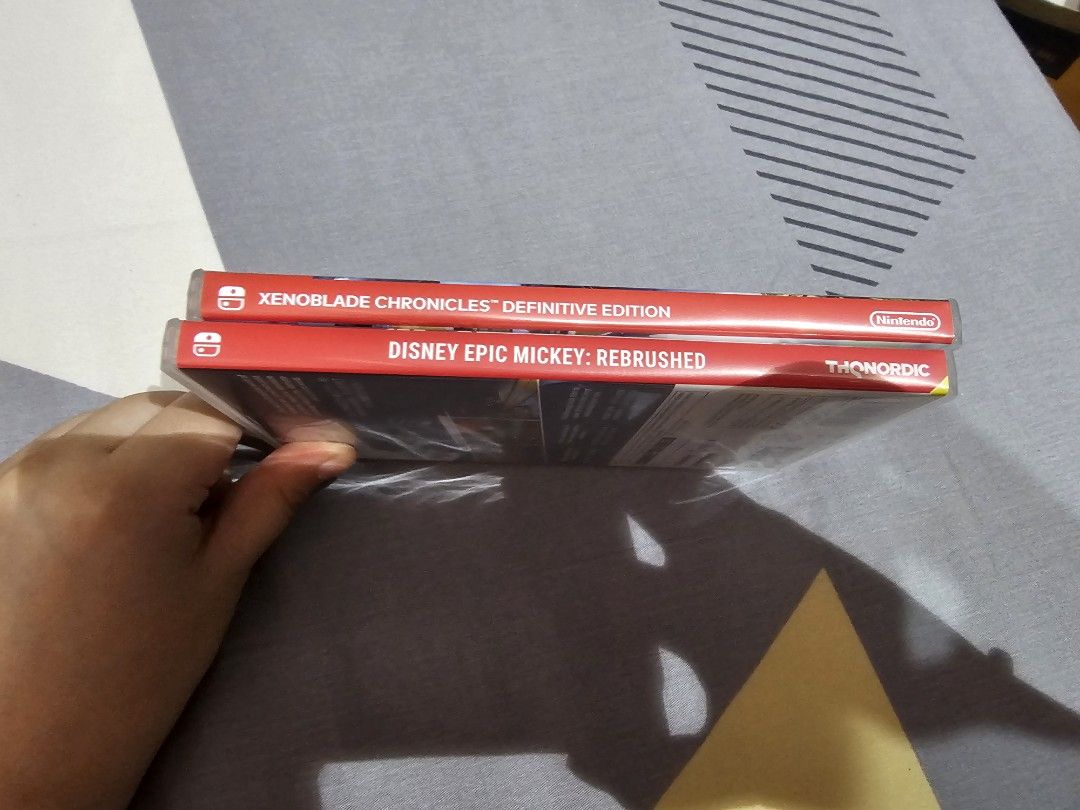Used Switch Games for Sale (Category: Nintendo) located in Manila. Submitted by yuxin237 (Listing ID 1468386671, Image 1). Description: Selling used Switch games as I no longer play them. Xenoblade Chronicles Definitive Edition and Disney Epic Mickey Rebrushed Price is currently at 1,400 each but can be negotiable. If additional details are needed please pm, willing to send video of game working..