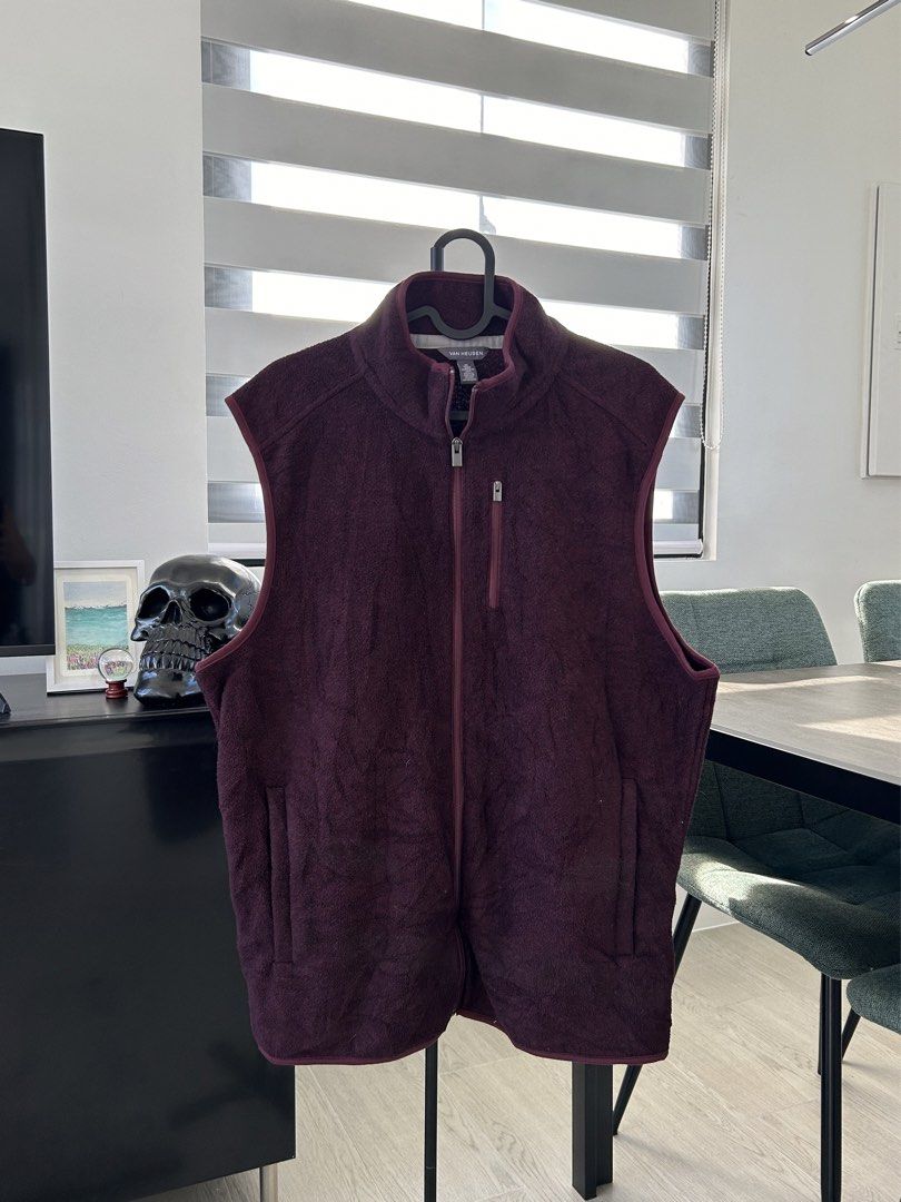 Van Heusen Fleece Vest (M) (Category: Vests) located in Dasmarinas. Submitted by sfclosetcleanup (Listing ID 1468344210, Image 1). Description: - Brand: Van Heusen - Color: Deep maroon - Size: Medium - Material: Soft fleece throughout - Closure: Full front zip - Pockets: 1 vertical chest zip pocket, 2 open hand pockets - Collar: Stand-up collar for extra warmth.