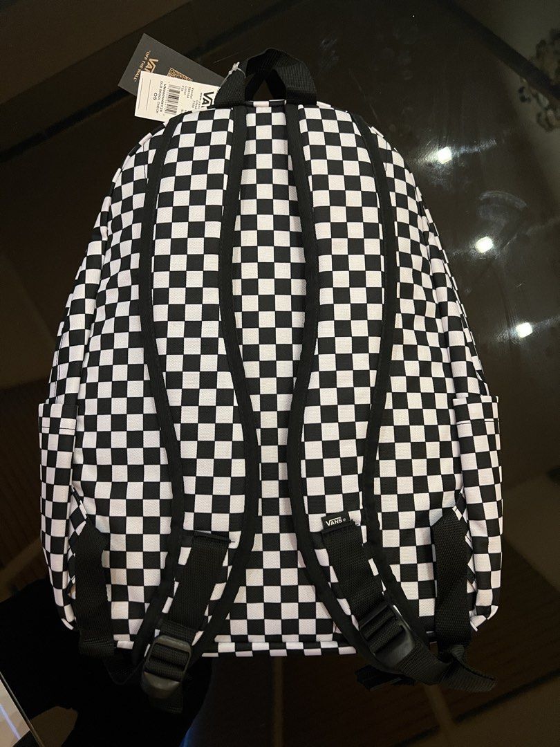 Vans Old Skool Check Backpack Black White (Category: Backpacks) located in Mandaluyong City. Submitted by maropa (Listing ID 1468370696, Image 2). Description: - Authentic Vans Old Skool Check backpack in classic black and white checkerboard - Brand new with original store tags still attached - Front zip pocket for quick access to essentials - Comfortable adjustable padded shoulder straps featuring the Vans logo tag - Standard size, perfect for d