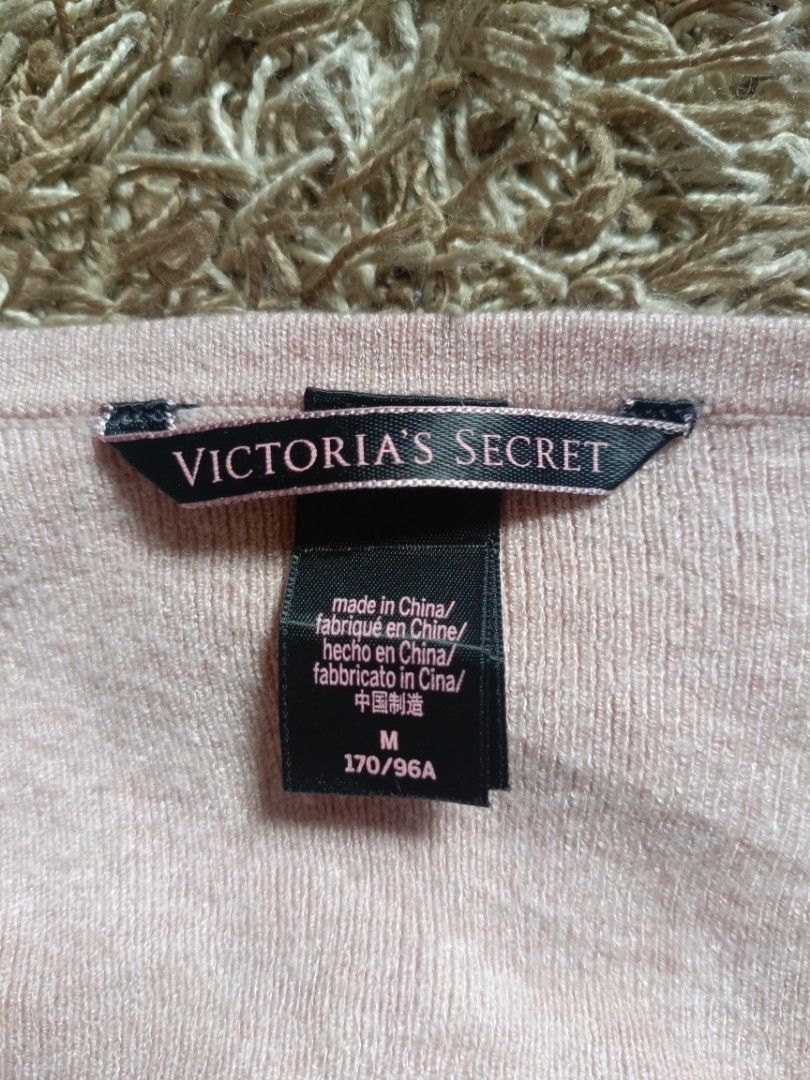 VICTORIA SECRET SQUARE NECK (Category: Longsleeves) located in Kitcharao. Submitted by ialyga08 (Listing ID 1468287447, Image 2). Description: This is a light pink Victoria's Secret square-neck, long-sleeve cropped corset sweater top featuring a front hook-and-eye/button placket.