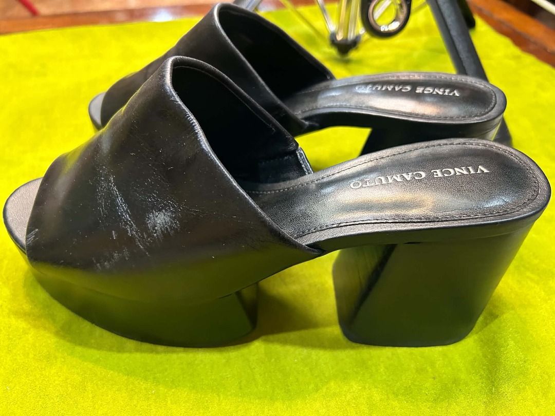 Vince Camuto Corlina Platform Mule (Category: Sneakers & Footwear) located in Quezon City. Submitted by abk_storemandaluyong25 (Listing ID 1468460551, Image 3). Description: • Brand: Vince Camuto • Model: Corlina Platform Mule / Chunky Block Heel Slide • Colorway: Matte Black Leather • Design Features: A dramatic, retro-inspired statement shoe featuring a wide black leather upper band strap, a chunky wrapped platform midsole, a high block heel, a