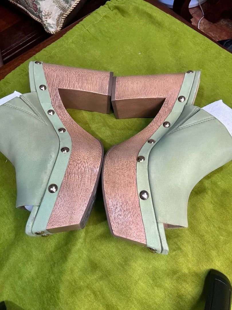 Vince Camuto Jeckima Platform Mule (Category: Sneakers & Footwear) located in Quezon City. Submitted by abk_storemandaluyong25 (Listing ID 1468459772, Image 3). Description: • Brand: Vince Camuto • Model: Jeckima Platform Mule / Wood Heeled Clog • Colorway: Sage Green / Olive Nubuck Suede • Design Features: A '70s-inspired platform mule featuring a soft matte sage green suede upper, an open square toe, a thick faux-wood or real wood block heel, a