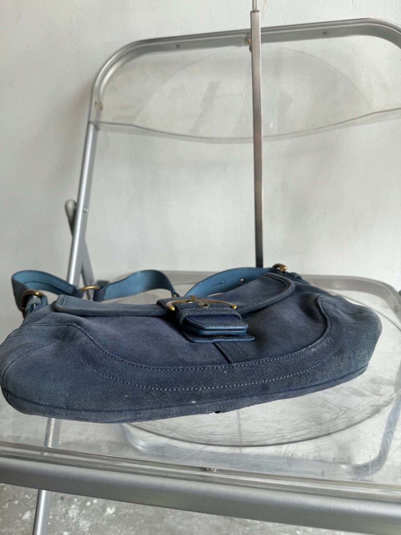 Vintage Coach Blue Suede Shoulder Bag (Category: Shoulder Bags) located in Manila. Submitted by prettyyybagss (Listing ID 1468385312, Image 2). Description: - Vintage Coach shoulder bag in striking blue suede with smooth leather trim - Adjustable strap and classic brass-tone hardware with front buckle closure - Interior features signature Coach monogram fabric, zippered pocket, and authentic creed patch - Reliable YKK zipper hardware - Shows expe
