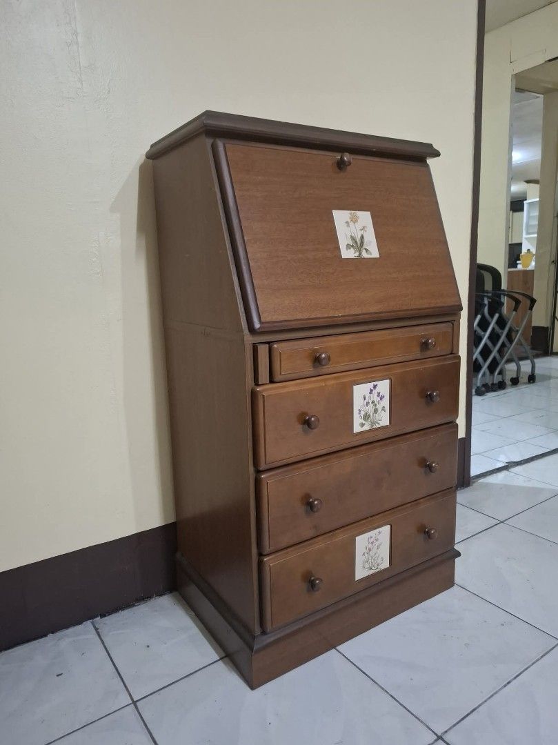 Vintage Fold Down Secretary Writing Desk Study Table with Drawers (Category: Tables & Sets) located in Quezon City. Submitted by dannikkishoppe2 (Listing ID 1468304723, Image 2). Description: Vintage Fold Down Secretary Writing Desk Study Table with Drawers ‼️₱6800‼️ Please manage your expectations as there might be minimal flaws. Color may vary due to lighting, it may appear darker or lighter in person. Check photos first before buying. Please r