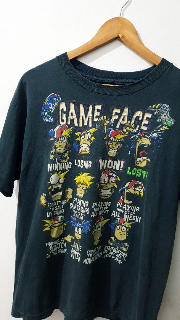 Vintage Game Face Gamer (Category: Tshirts & Polo Shirts ) located in Taguig. Submitted by wethrifting2021 (Listing ID 1468417500, Image 2). Description: Item: Vintage Game Face (Metal Slug)🔥 Size: Cut tag Width: 20.5 Length: 25.5 Condition: Good Issue: Trash Condition SWIPE MORE DETAILS. DM to purchase 📩.