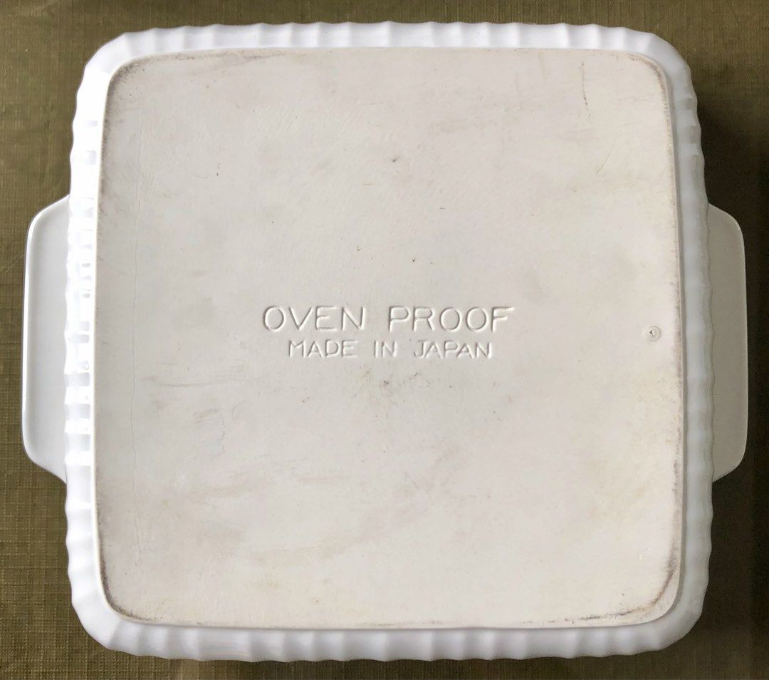 Vintage Japanese Oven Proof White Ceramic Square Baking Dish (Category: Cookware & Accessories) located in Quezon City. Submitted by may.reyes (Listing ID 1468297980, Image 3). Description: - Type: Vintage white ceramic square baking dish - Origin: Made in Japan (stamped Oven Proof) - Design: Elegant fluted sides with convenient side handles - Size: Approximately 8 inches across - Condition: Clean interior glaze with minimal signs of prior use - 