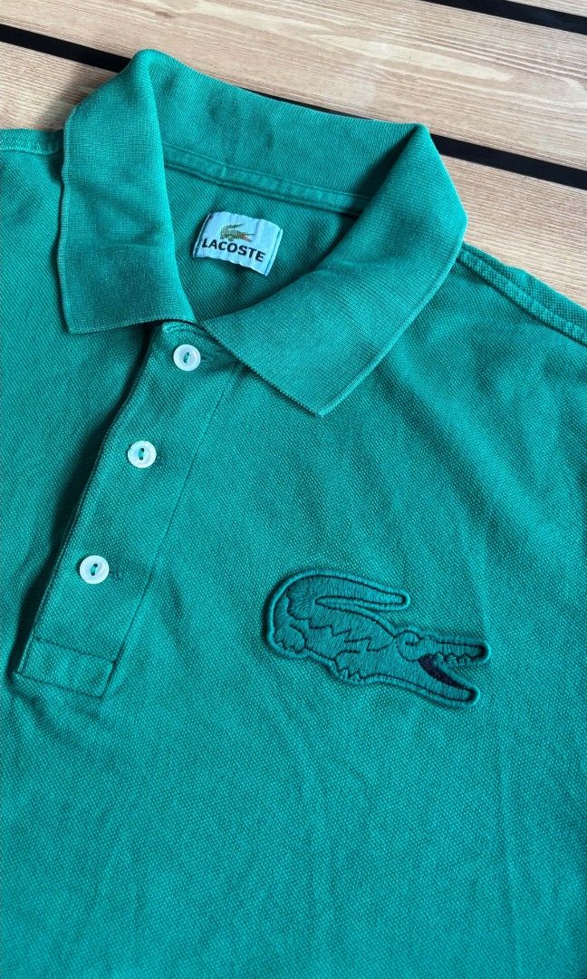 Vintage Lacoste Big Logo (Category: Tshirts & Polo Shirts ) located in Santo Tomas. Submitted by rency_thrift (Listing ID 1468440829, Image 2). Description: L@coste Vintage Green Polo Shirt✨️ Authentic ✅️ Excellent Condition✅️ Dimes: Width:20 / Length: 25.5 / Size: Medium Loc. STO..TOMAS DAVAO Del Norte📍.