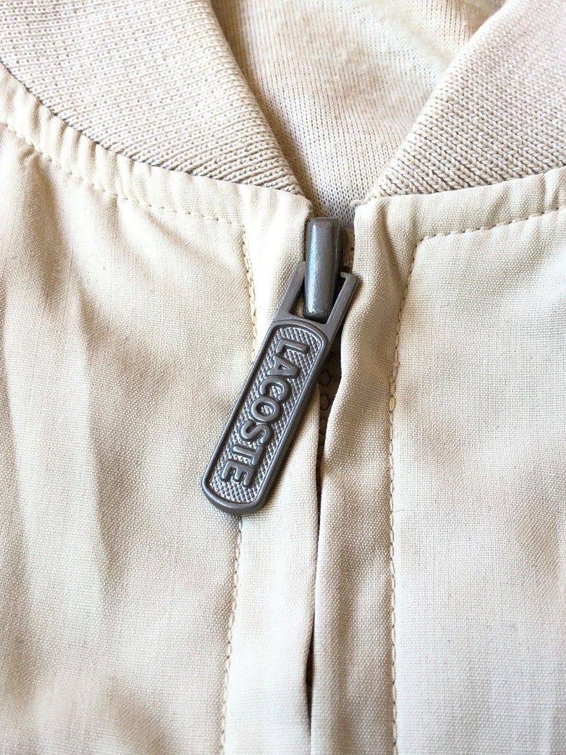 VINTAGE LACOSTE JACKET (Category: Coats, Jackets and Outerwear) located in Baybay. Submitted by dathrifted (Listing ID 1468357832, Image 3). Description: VINTAGE LACOSTE JACKET Width- 23.5 Lenght- 26.5 EXCELLENT CONDITION HONEST ISSUE: lints inner side and minimal (Dirt or Stain) not sure if removable. see last 2 pictures PM if Interested📩📩📩.