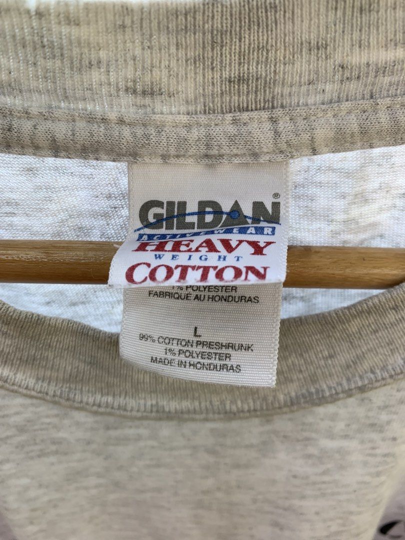 Vintage late 1990s/Y2K statement tee (Category: Tshirts & Polo Shirts ) located in Cagayan de Oro. Submitted by premium_thrifts (Listing ID 1468402483, Image 3). Description: Gray colorway. Good condition. Double stitch on both sleeves and hem Fits Large L29.5" x W21.5" 20" (shoulder to shoulder) 9" (sleeve length) Issue: faint spot stains on some parts, yellow stains and tears on the collar Add shipping fee (via JRS or J&T).