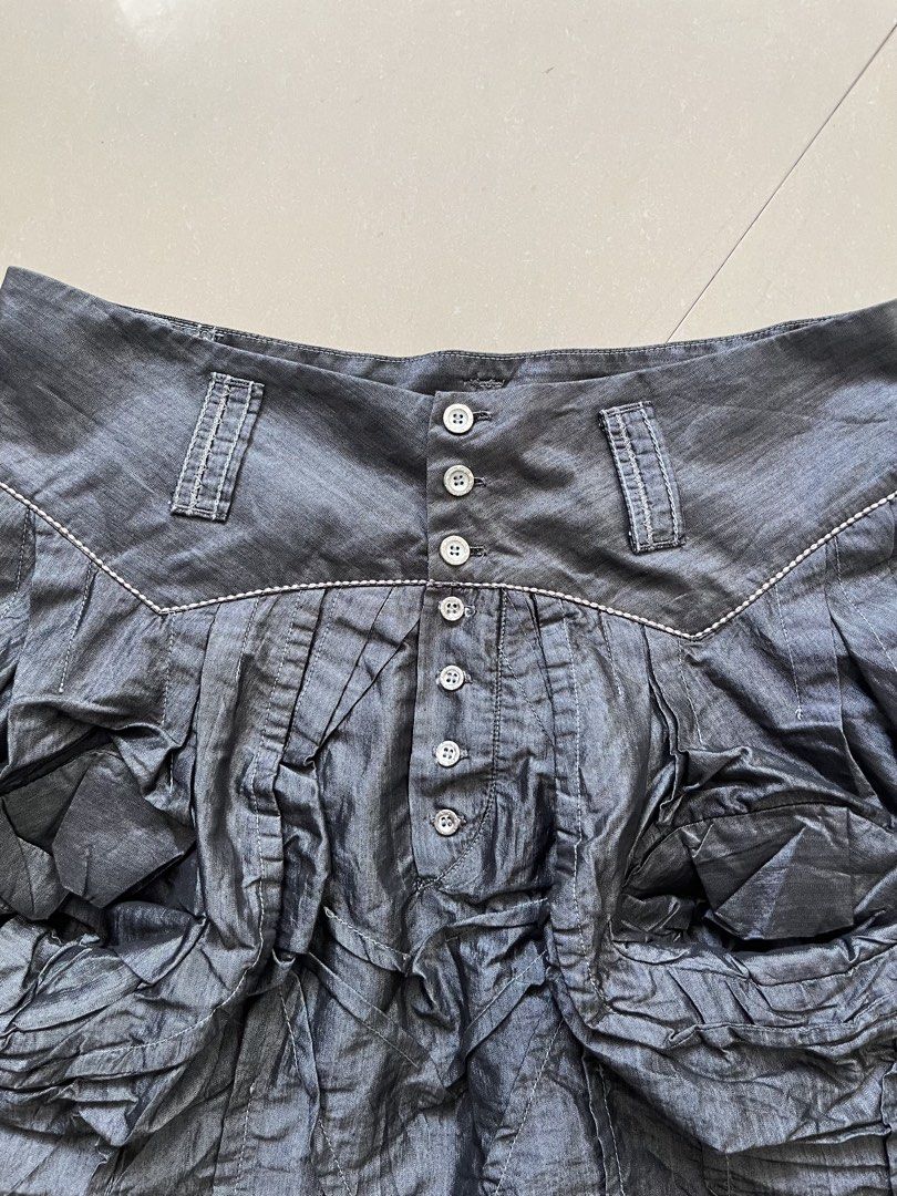 VINTAGE MARITHE FRANCOIS GIRBAUD ORIGAMI SKIRT (Category: Skirts) located in Magarao. Submitted by chalkzone20 (Listing ID 1468493667, Image 3). Description: VINTAGE MARITHE & FRANCOIS GIRBAUD ORIGAMI STYLE MINI SKIRT Size: I: 42 D:26 F:USA: 27 Condition: 9.5/10 Color rate: 9.5/10 Issue: needs wash Made in Italy Hearing offers.