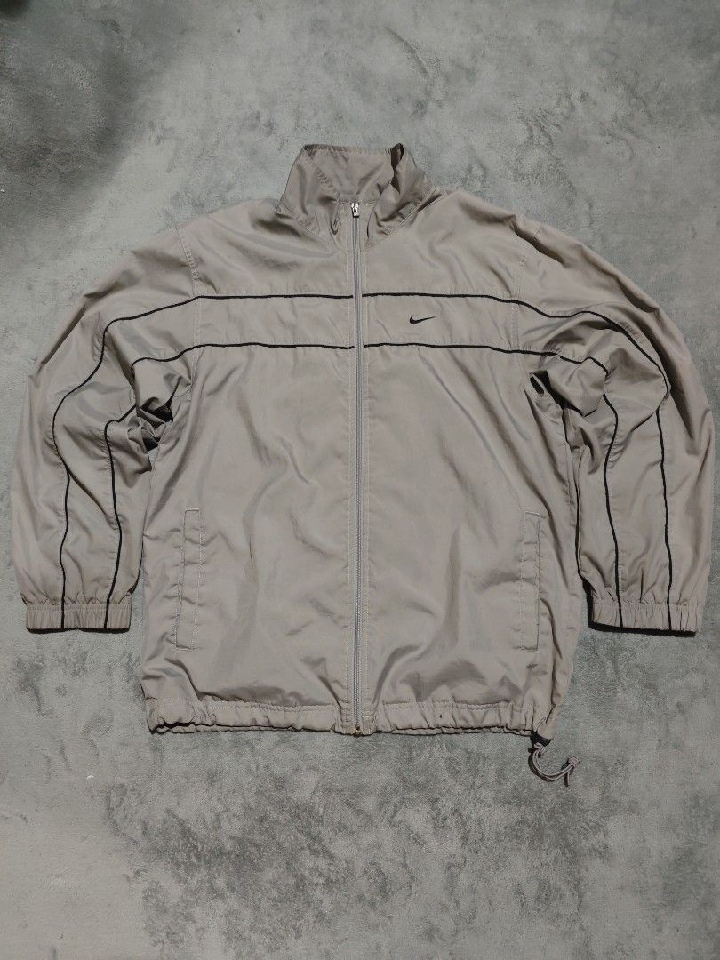 Vintage Nike 2Lines windbreaker (Category: Hoodies) located in Dagupan City. Submitted by johnny.flips (Listing ID 1468450874, Image 1). Description: 23W 29L Gray Color way in excellent condition needs wash only.