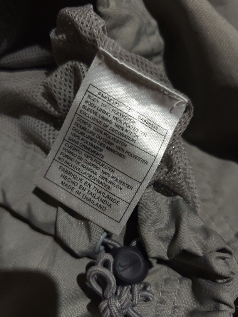Vintage Nike 2Lines windbreaker (Category: Hoodies) located in Dagupan City. Submitted by johnny.flips (Listing ID 1468450874, Image 3). Description: 23W 29L Gray Color way in excellent condition needs wash only.