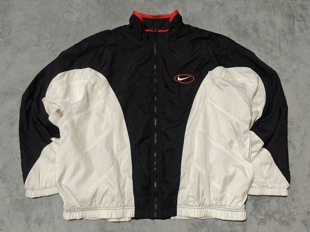 Vintage Nike Oval Windbreaker (Category: Coats, Jackets and Outerwear) located in Dagupan City. Submitted by johnny.flips (Listing ID 1468451238, Image 2). Description: 26.5W 27L good condition check pics for issues last pic is inside stain only.