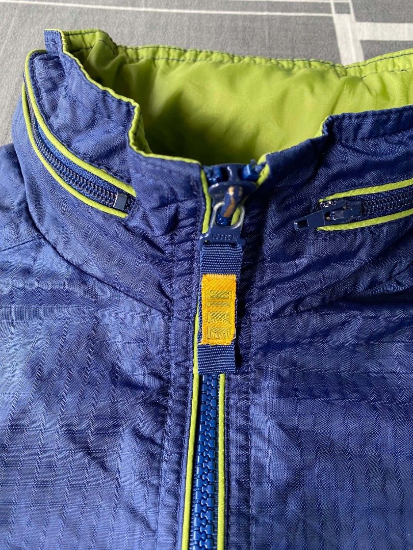 Vintage nike windbreaker packable hood (Category: Coats, Jackets and Outerwear) located in Manila. Submitted by raymondrob54698 (Listing ID 1468318361, Image 3). Description: Size youth large best fit medium adult 22x26 brand new condition no issue.