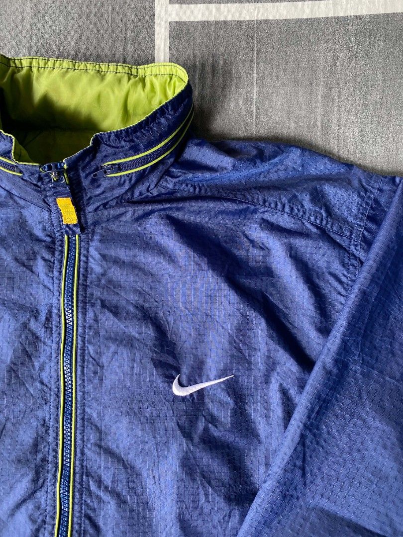 Vintage nike windbreaker packable hood (Category: Coats, Jackets and Outerwear) located in Manila. Submitted by raymondrob54698 (Listing ID 1468318361, Image 2). Description: Size youth large best fit medium adult 22x26 brand new condition no issue.