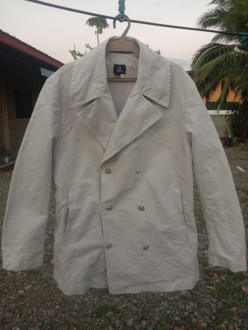 Vintage VERSACE double breasted jacket (Category: Coats, Jackets and Outerwear) located in Baguio. Submitted by oliviapreloved100620 (Listing ID 1468326451, Image 1). Description: Light gray double breastedade in Italy. 31" x 22".