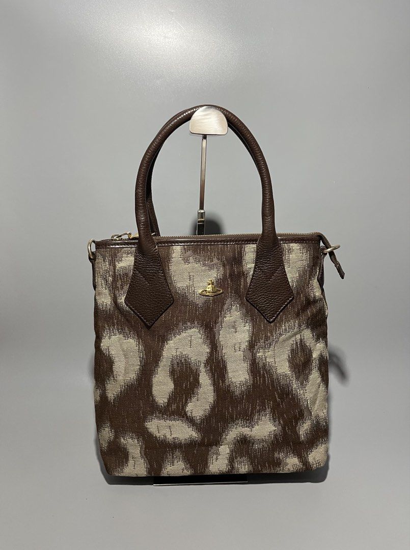 Vivienne Westwood Leopard Pattern Leather Bag (Category: Luxury Bags & Wallets) located in Caloocan City. Submitted by jvn_23 (Listing ID 1468403049, Image 1). Description: Vivienne Westwood Leopard Pattern Leather Bag Authentic/Legit💯 Good Condition 📍 Color rate: 10/10📍 Dimes: 12” Length 12” Width Note: Please review all photos for minor signs of wear. Color may vary due to lighting..