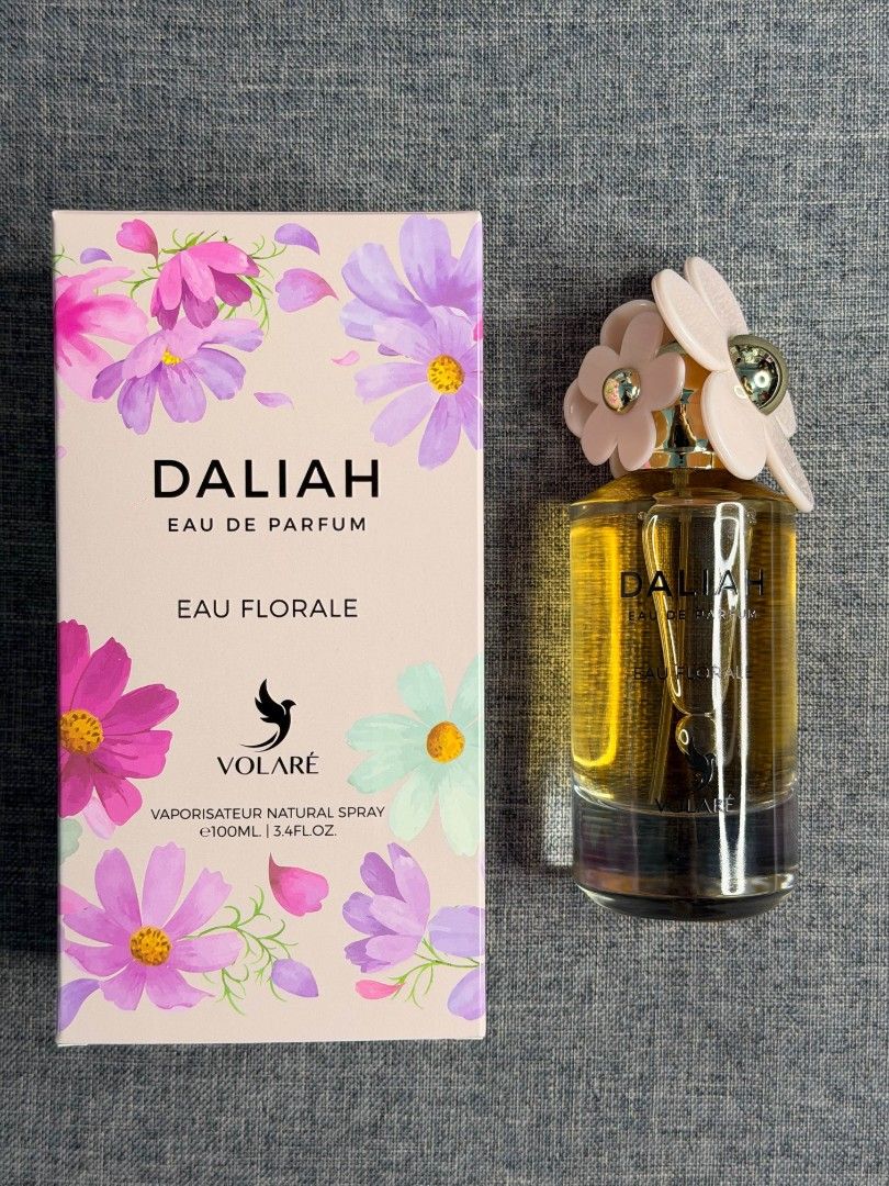 Volaré Daliah Eau Florale Eau De Parfum 100ml (Category: Fragrance & Deodorants) located in Paranaque City. Submitted by barbs24 (Listing ID 1468420309, Image 1). Description: - Brand: Volre Daliah Eau Florale - Volume: 100ml (full) - Formulation: Natural spray vaporisateur - Bottle: Clear glass showing full volume, topped with a flower-shaped cap - Packaging: Includes matching decorative box with pastel floral print - Condition: Brand new / Mall