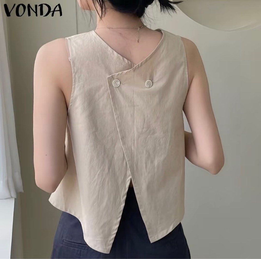 VONDA Beige Sleeveless Crop Top with Button Back (Category: Sleeveless) located in Manila. Submitted by frances_001 (Listing ID 1468334963, Image 3). Description: Color: Versatile neutral beige Style: Sleeveless crop top with high round neckline Detail: Unique crossover back with two upper buttons - Fabric: Lightweight and breathable for warm weather .