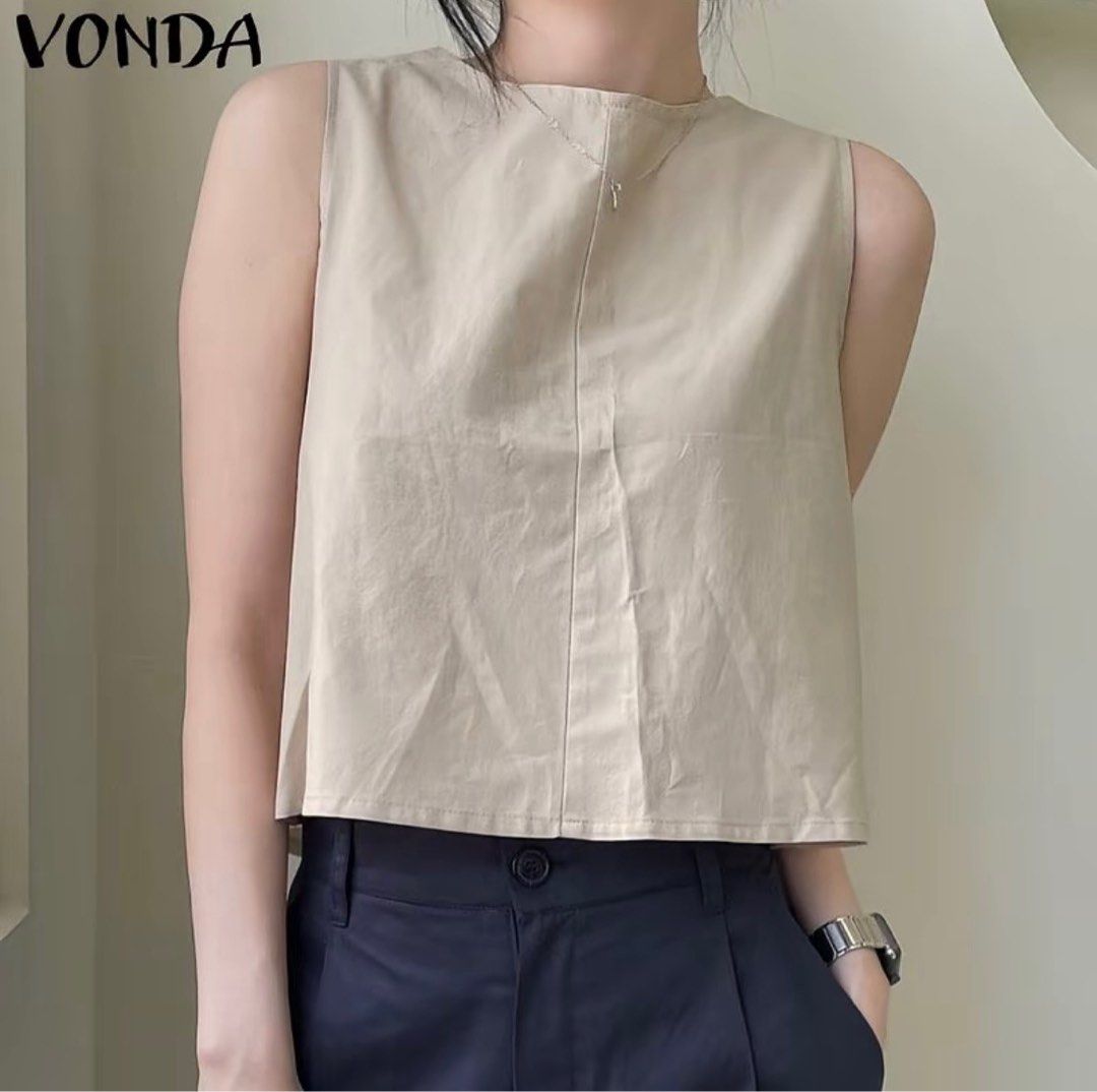 VONDA Beige Sleeveless Crop Top with Button Back (Category: Sleeveless) located in Manila. Submitted by frances_001 (Listing ID 1468334963, Image 2). Description: Color: Versatile neutral beige Style: Sleeveless crop top with high round neckline Detail: Unique crossover back with two upper buttons - Fabric: Lightweight and breathable for warm weather .