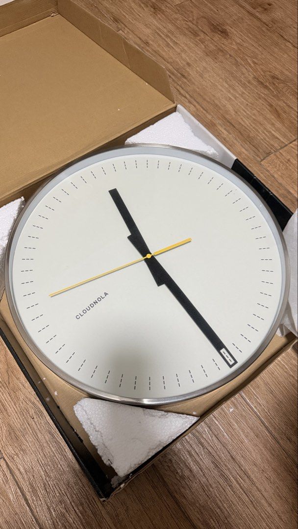 Wall Clock Cloud Nola (Category: Wall Decor) located in Quezon City. Submitted by mythriftdeals (Listing ID 1468447295, Image 1). Description: Battery Operated Minimal black dial with a stainless steel case Silent movement — no distracting seconds tick 14” x 5½” x 3½” .