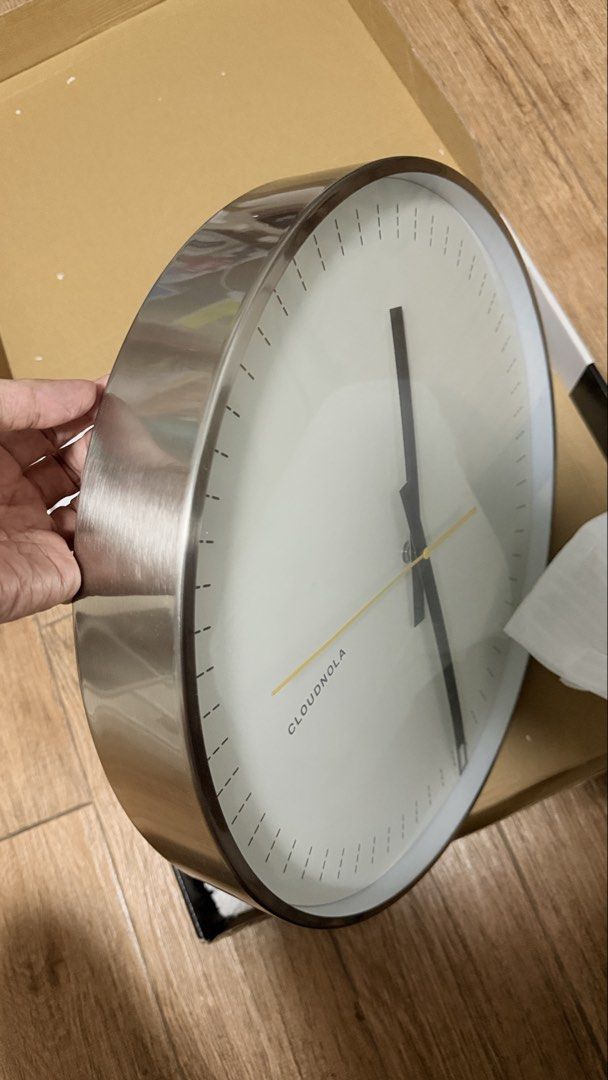 Wall Clock Cloud Nola (Category: Wall Decor) located in Quezon City. Submitted by mythriftdeals (Listing ID 1468447295, Image 2). Description: Battery Operated Minimal black dial with a stainless steel case Silent movement — no distracting seconds tick 14” x 5½” x 3½” .