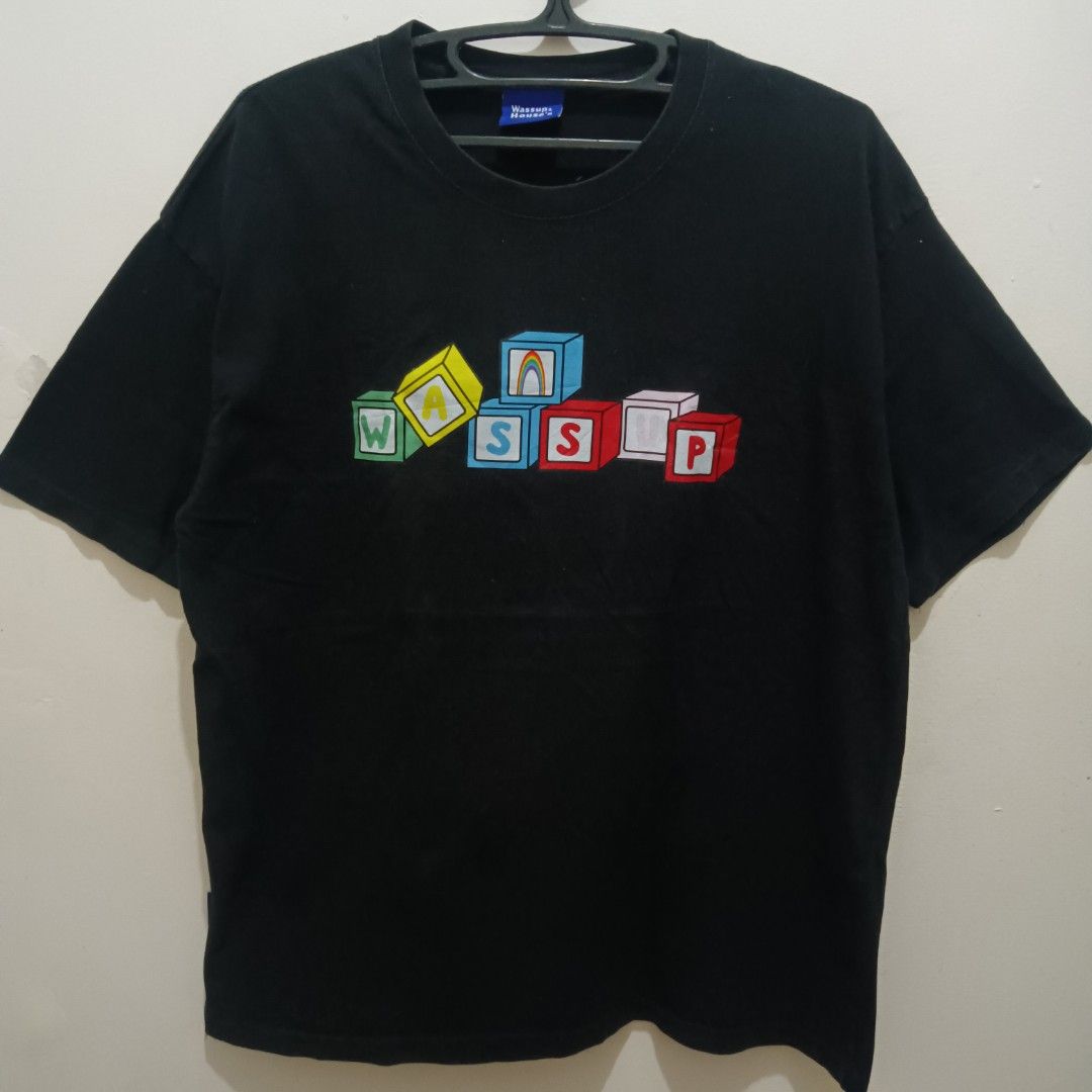 WASSUP Letter Blocks Graphic Shirt (Category: Tshirts & Polo Shirts ) located in Caloocan City. Submitted by jaychingsss (Listing ID 1468398396, Image 1). Description: Wassup Letter Blocks Graphic Shirt - 100 22x27 Color Rate: 9.5/10 With Neck tag, Cut Washtag NEED WASH.