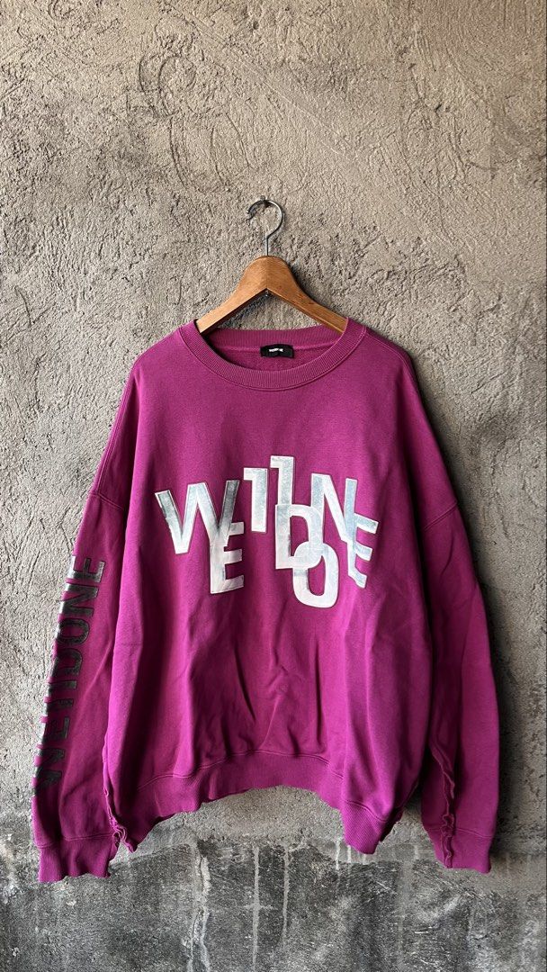 We11done Magenta Logo Sweatshirt (Category: Coats, Jackets and Outerwear) located in Cabuyao City. Submitted by bulandos (Listing ID 1468377390, Image 1). Description: - Brand: We11done (Resort 2020 Collection) - Color: Bright Magenta - Size: Medium (Boxy, oversized fit) - Material: Heavyweight cotton & polyurethane blend (Made in Korea) - Details: Large metallic front logo, small back print, branding on right sleeve, and distressed hem.
