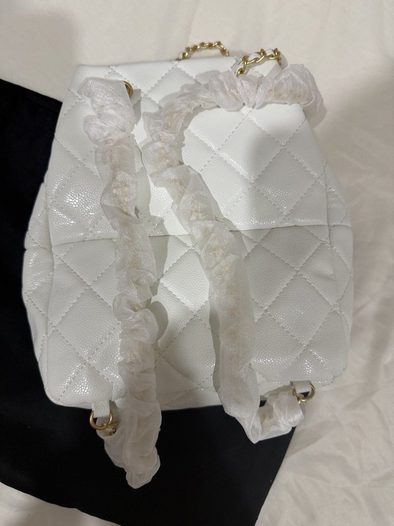 White backpack (Category: Backpacks) located in Singapore. Submitted by royal.randombuy (Listing ID 1468483921, Image 4). Description: -brand new -with dust bag -no nego thanks .
