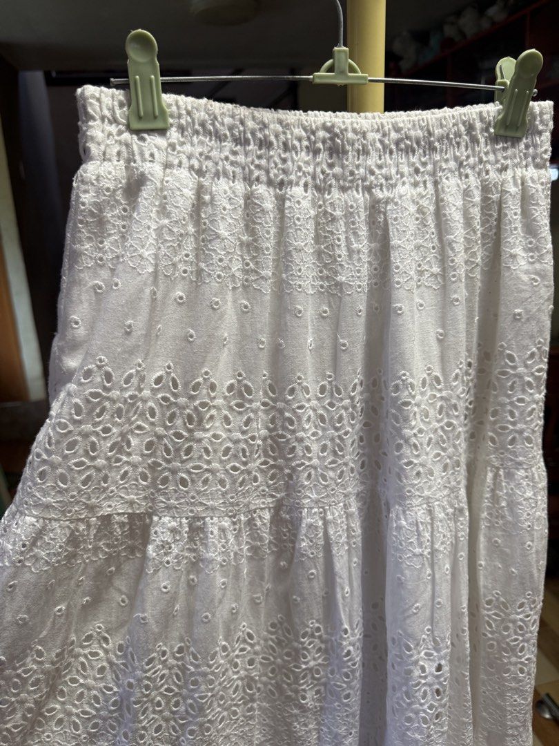 White Eyelet Maxi Skirt (Category: Skirts) located in Cebu City. Submitted by hotchkisscebu (Listing ID 1468472248, Image 3). Description: - Color: White - Design: Floral eyelet embroidery with a tiered 3-panel look - Waistband: Stretchable elastic pull-on style for all-day comfort - Details: Subtle cut-out patterns throughout - Length: Mid-calf - Style: Perfect everyday piece for the warm weather.