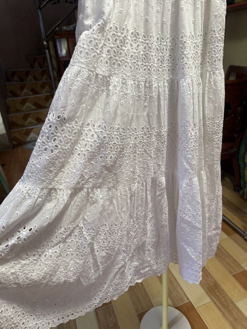 White Eyelet Maxi Skirt (Category: Skirts) located in Cebu City. Submitted by hotchkisscebu (Listing ID 1468472248, Image 2). Description: - Color: White - Design: Floral eyelet embroidery with a tiered 3-panel look - Waistband: Stretchable elastic pull-on style for all-day comfort - Details: Subtle cut-out patterns throughout - Length: Mid-calf - Style: Perfect everyday piece for the warm weather.