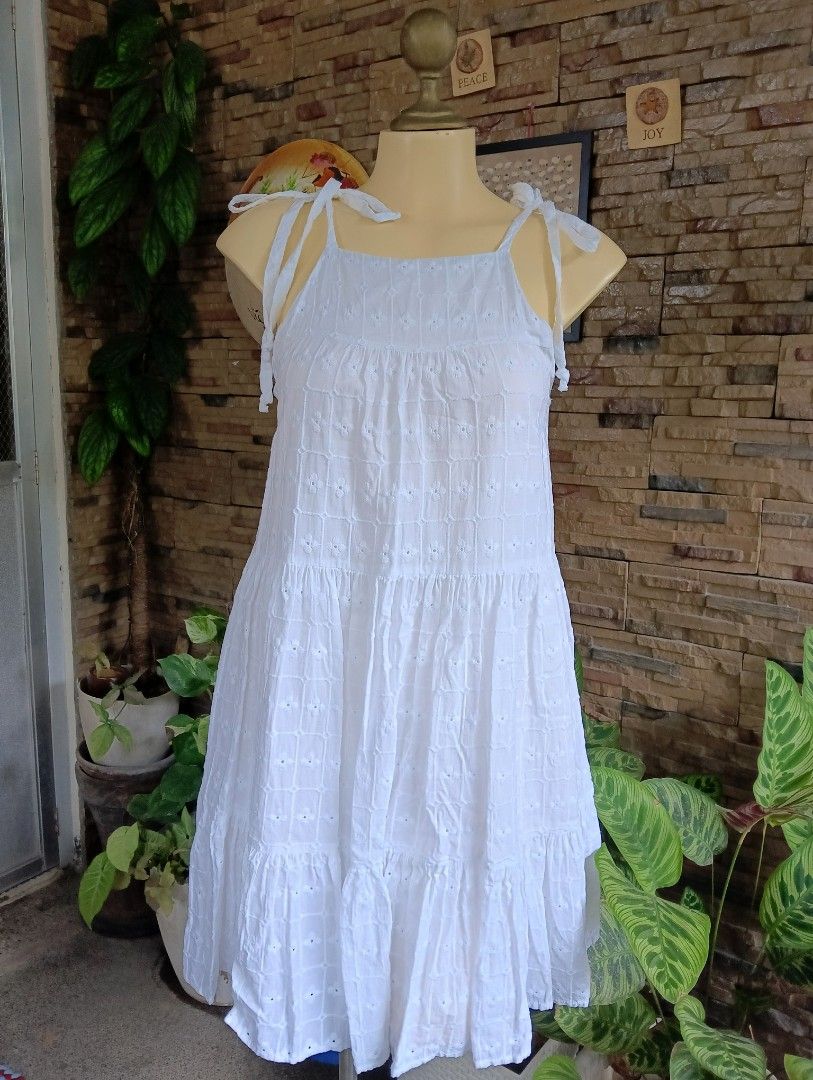 White Eyelet Tiered Doll Dress by Mi Ami (Category: Dresses) located in Rizal. Submitted by timeless_shop (Listing ID 1468307835, Image 3). Description: 🔥 ORIGINAL mi ami for francesca's White Eyelet Tiered Dress 📏 Bust: 17 inches lay flat (34) 📏 Waist: Free / Empire - 18 inches lay flat 📏 Length: 33 inches mula sa tali Below Knee / Midi 🎨 Color: White - Eyelet Embroidery! ✂️ Style: Tie Strap / Spaghetti - Tiered Dress 💯 Good Condition: 10/