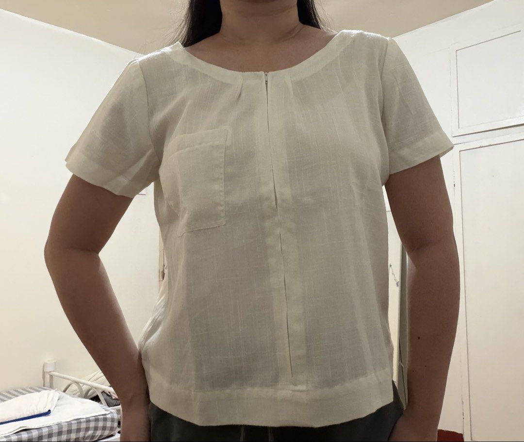 White Linen Blend Zip Up Top with Pocket (Category: Blouses) located in Subic. Submitted by ciesells (Listing ID 1463149769, Image 3). Description: Bust: 40 - Working zipper - Includes a single chest pocket - No issues mop: bpi/maribank/maya.