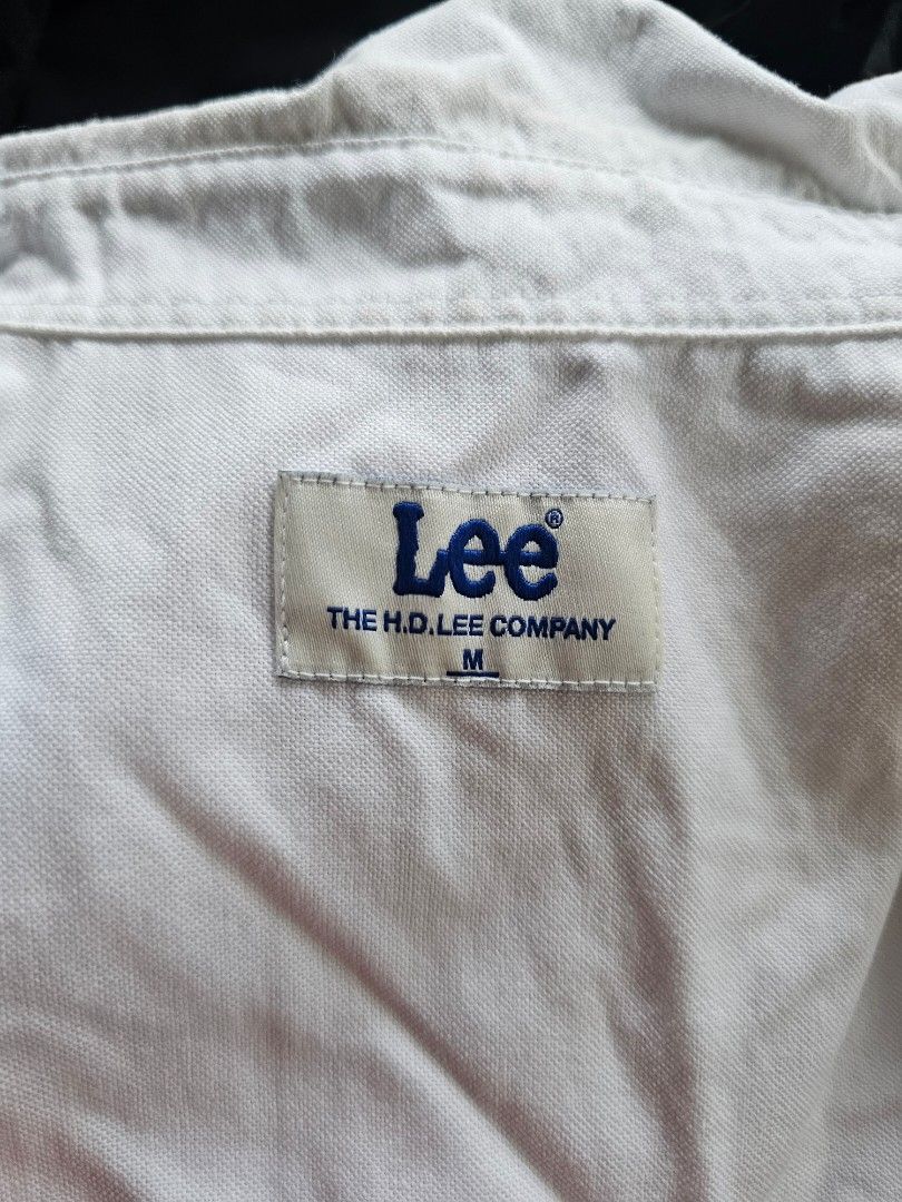 white long-sleeve button-down cotton shirt (Category: Tshirts & Polo Shirts ) located in Baguio. Submitted by kayeonlineshop (Listing ID 1468340308, Image 3). Description: white long-sleeve button-down cotton shirt featuring a small chest patch logo Lee.