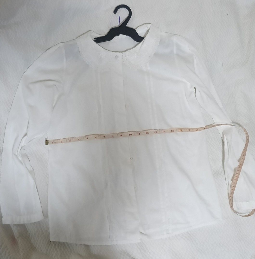 white long-sleeve Peter Pan collar blouse (Category: Blouses) located in Antipolo. Submitted by foncimigz (Listing ID 1468459954, Image 2). Description: PRE-LOVED white long-sleeve Peter Pan collar blouse size l 24 w 19.