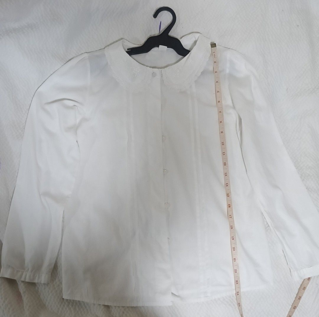 white long-sleeve Peter Pan collar blouse (Category: Blouses) located in Antipolo. Submitted by foncimigz (Listing ID 1468459954, Image 3). Description: PRE-LOVED white long-sleeve Peter Pan collar blouse size l 24 w 19.