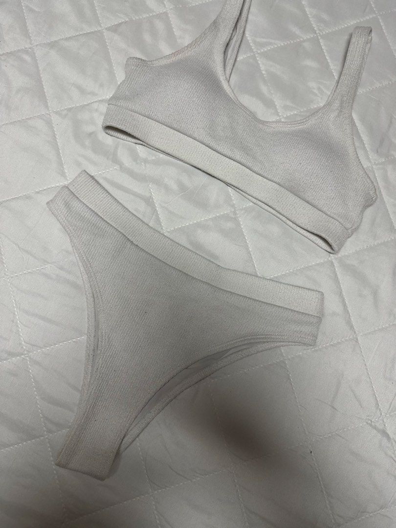 White ribbed bikini set two piece swimwear (Category: Bikinis & Swimsuits) located in Valenzuela. Submitted by prelovedbyramsie (Listing ID 1468419813, Image 2). Description: - Color: White - Material: Ribbed fabric - Design: Minimalist two-piece set - Top: Scoop neck with thick straps - Bottom: High-waisted cut.